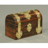 A Victorian coromandel brass mounted stationery casket, with domed top. Width 23.5 cm.