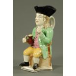 A Yorkshire style Toby jug, typical form, holding a foaming quart and wearing a spotted neckerchief,