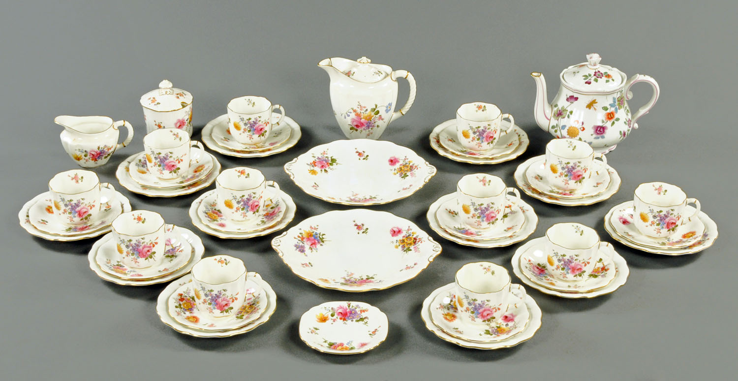 A Royal Crown Derby tea service, teapot, sugar basin, milk jug, 12 cups, 12 saucers,