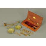 A set of hand held brass apothecary scales, 19th century, with box ends, the beam stamped "P.