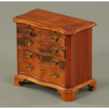 A mahogany miniature chest of drawers, 20th century,