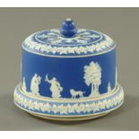 A Jasperware stilton dish and cover, with sprigged classical style decoration,