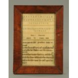 A sampler, Mary Warren 1838, alphabet, numbers and text. 30 cm x 19 cm, framed.