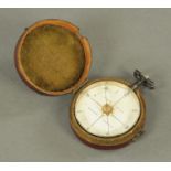 A George III pocket compass, by Robert Bancks, the plated body with enamel dial inscribed "Bancks,
