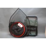 A telescopic specimen net, folding fishing chair and keep net.