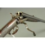 An E.M. Reilly & Co. 36 x 2 1/4 Cal. double hammer rifle, with 26" barrels, barrels inscribed "E.M.