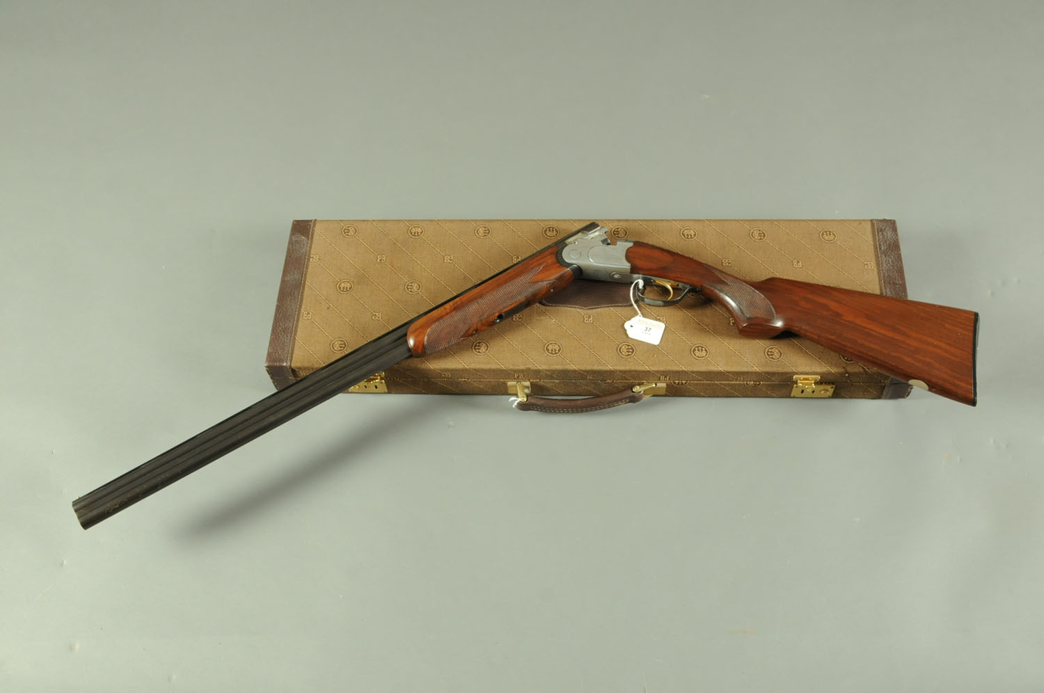 A Beretta 20 bore 687 Sporter over/under shotgun, with 28" barrels, 1/2 and 1/4 choke,