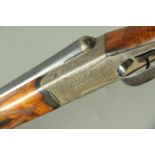 A Somerton Guns 12 bore side/side shotgun, with 27" barrels, improved and 1/2 choke, boxlock,