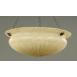 A carved alabaster ceiling light shade, circa 1920,