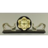 A French Art Deco black slate and onyx mantle clock, circa 1920's/30's,
