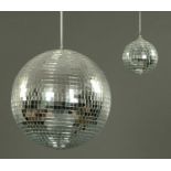 Two glitter balls, late 20th century, approximately 23 cm and 9 cm diameter.