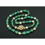 A pearl and semiprecious stone necklace, with 9 ct gold clasp.