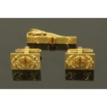 A pair of Chinese 14 ct gold cufflinks, with matching tie clip, rectangular,