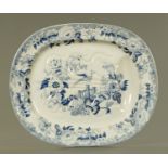 A 19th century blue and white transfer printed turkey dish, impressed "18" to underside.