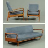 Greaves and Thomas, a 1960's dark teak three piece suite, comprising sofa bed,