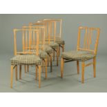 A set of six Gordon Russell oak dining chairs,