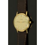 A vintage Juvenia 18 ct gold cased gentleman's wristwatch, manual. Case diameter 34 mm.