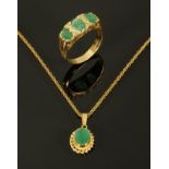 A 9 ct gold ring set with three emeralds and small diamonds, size 0,