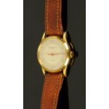 An 18 ct gold cased Record Watch Co. wristwatch, 17 jewels. Case diameter 33 mm.