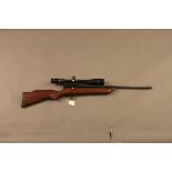 SMK XS78 CO2 powered .22 air rifle, fitted with Tasco 6-24 x 40 telescopic sight.