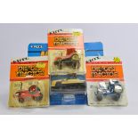 Ertl 1/64 group of Tractors. M in bubble packaging. (4)
