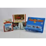 Group of smaller scale Farm Toy Tractor Models including Ertl Vintage Series and Farm Classics.