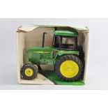 Ertl 1/16 John Deere 4WD Tractor. NM in VG to E Box.