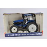 Spec Cast 1/16 Ford 8770 Tractor. NM to M in VG Box.