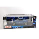 Maisto 1/18 Diecast Sports Car issue. Porsche Cayman. M in Box.