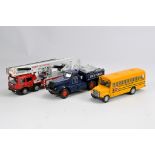 Trio of diecast models including School Bus, Pickfords and Fire Rescue. E to NM. (3)