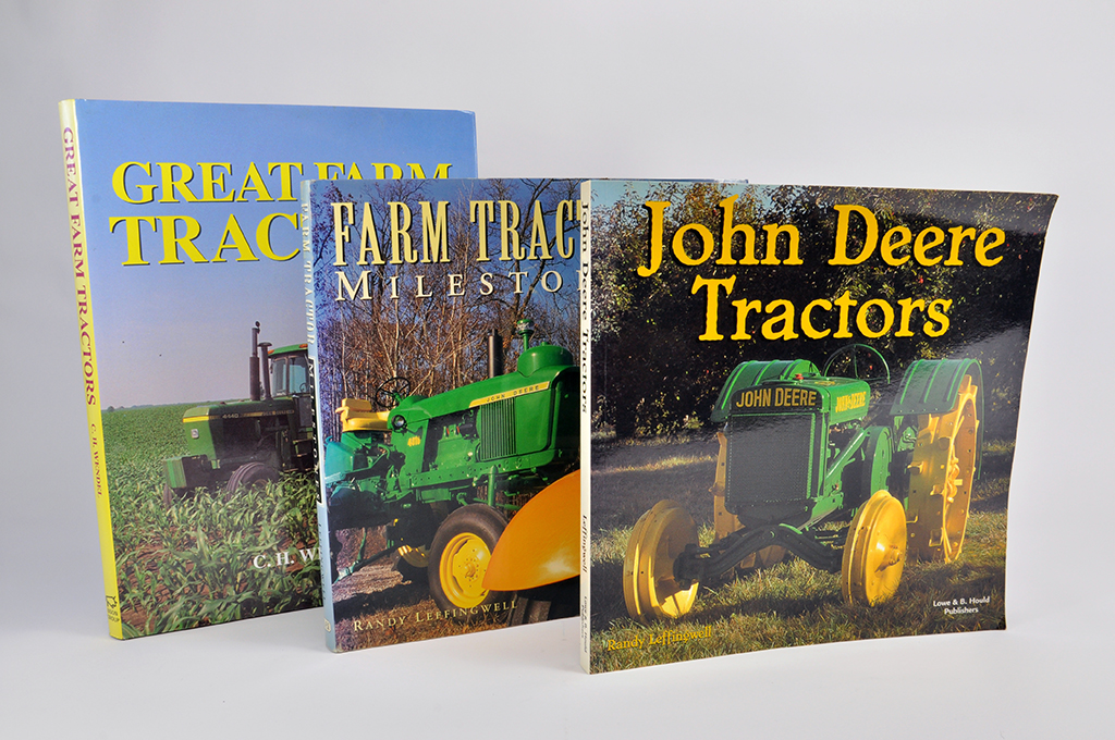 Trio of John Deere Tractor Reference books. (3)