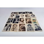 A group of vintage cinema movie star postcards / photographs.