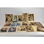 A group of vintage cinema movie star postcards / photographs.