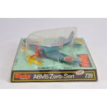 Dinky Toys No. 739 Zero-Sen Aircraft finished in metallic aqua. NM to M in E Bubble Packaging.