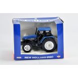 Ertl New Holland 8560 Tractor. NM to M in G Box.