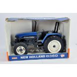 Ertl 1/16 New Holland 8360 Tractor. E to NM in G Box.