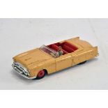 An unboxed Dinky 132 Packard Convertible. Tan / Red. G.