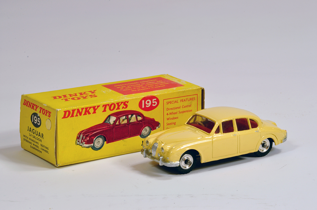 Dinky No. 195 Jaguar 3.4 Saloon with cream body. NM in E Box.