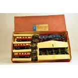 Chad Valley De Luxe Train Set. Comprising blue clockwork locomotive and 2 x first class coaches
