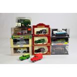 An assortment of diecast models from Corgi, Lledo, Dinky etc and others. M in Boxes. (12)