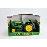 Ertl 1/16 John Deere Tractor. E to NM in Box.