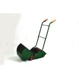 Webb Miniature Lawnmower. Green painted steel construction with red blades and wooden and metal