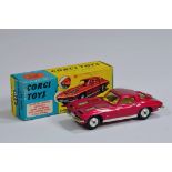 Corgi No. 310 Chevrolet Corvette Stingray in metallic cerise. E to NM in G to VG Box.