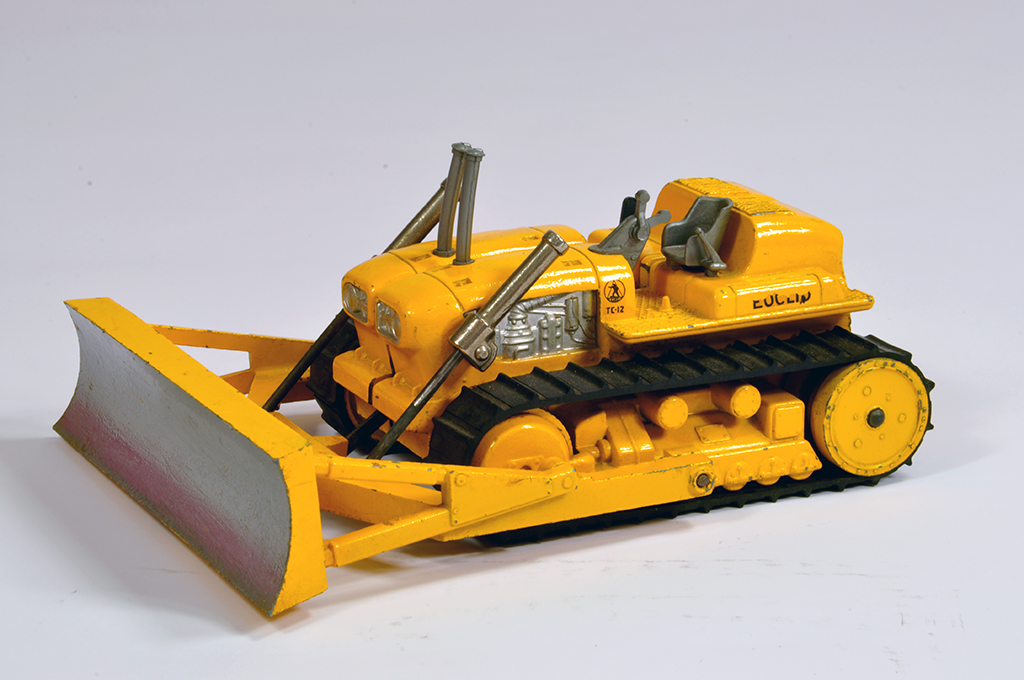 Corgi No. 1107 Euclid TC12 Tractor with lever operated dozer blade. Scarce Yellow. Generally G to