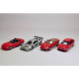 An unboxed group of 1/18 Cars. Burago etc. VG to E. (4)