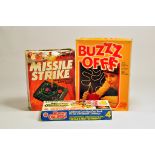 Group of retro / vintage / collectable games including Missile Strike, Buzz off and one other.
