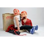 Jolly ventriloquist doll with box plus one other. Attention needed hence F to G. (2)