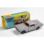 Corgi No. 320 Ford Mustang Fastback in silver with red interior and wire wheels. G in F Box.