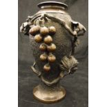 A Japanese Meiji period bronze vase, chocolate patinated with high relief grape and vine decoration,