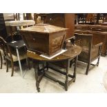 An oak oval gate-leg drop-leaf dining table,